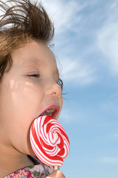 istock Little Girl & Lollipop 174324511