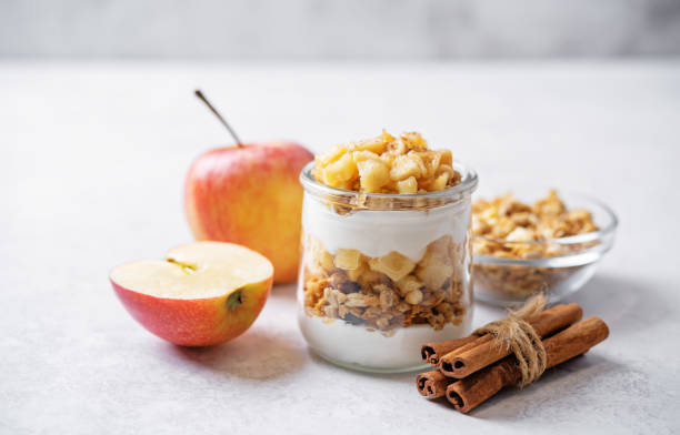 Apple greek yogurt granola parfait stock photo
