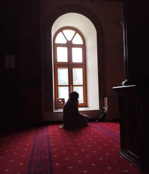 istock A woman prays 1743268067