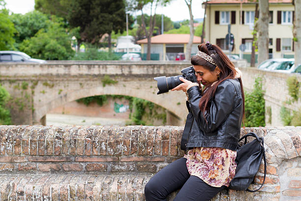istock clumsy Female Photographer 174327400