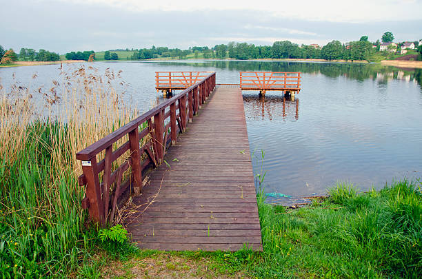 istock wooden pier on  resort lake 174328171