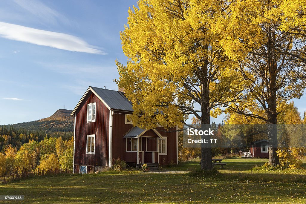 Old cottage in autumn colors Old house with garden in autumn colors Autumn Stock Photo