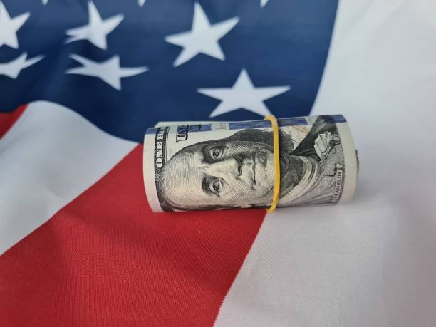 istock Dollar money and American flag 1743321046