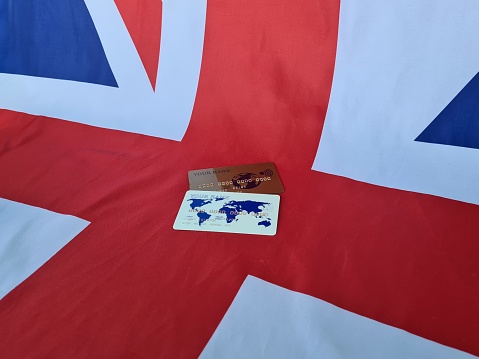 Flag of United Kingdom and Black Credit Card. Financial deposits deposit in England