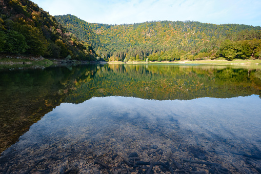 Bolu, Turkey - October 15 2023: View of Sülüklü Lake Natural Park which means Lake of the Leeches, with autumn forest landscape