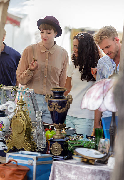 Young people shopping at Berlin's Street of 17th June Flea market. Vertical shot.http://img825.imageshack.us/img825/1604/berlinu.jpg