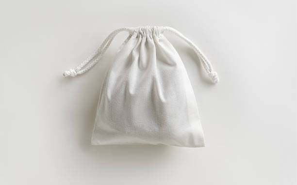 istock eco-friendly white cotton bag with ties on white background 1743364718