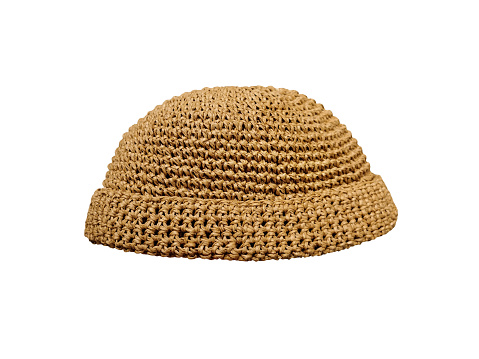 Docker knitted dark yellow hat isolated on white background. fashionable rapper hat.