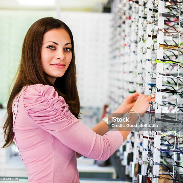 Woman In An Eyewear Store Stock Photo - Download Image Now - 20-24 Years, 20-29 Years, Abundance