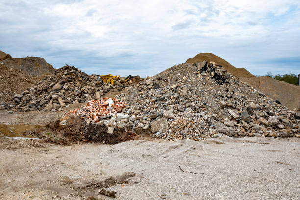 Heaps of material ready to be grinded into gravel.