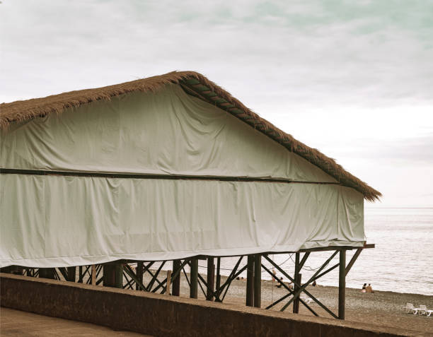 giant bungalow restaurant on sea beach