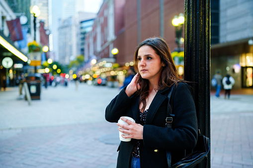 Worried businesswoman in the city