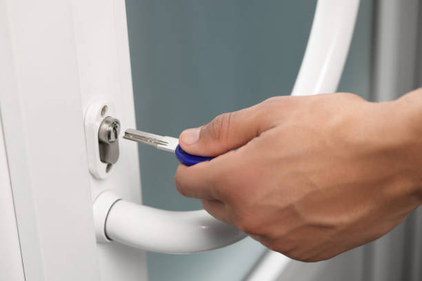 istock Man unlocking door with key, closeup view 1743461469