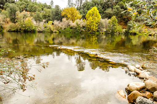 Looking out across the American River,with a stunning Autumn reflection.