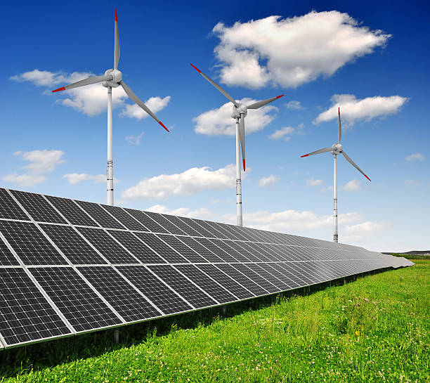 istock Solar energy panels with wind turbines 174355762