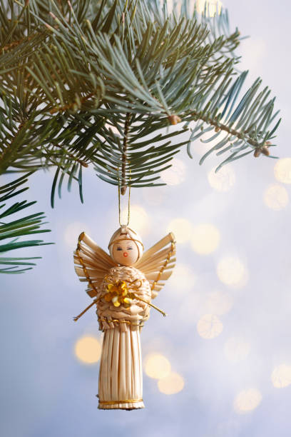istock Straw angel on christmas tree 1743560851