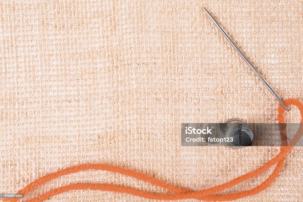 Arts Crafts fond: Aiguille et du fil tapissés en jute. Orange - Photo de Aiguille - Mercerie libre de droits