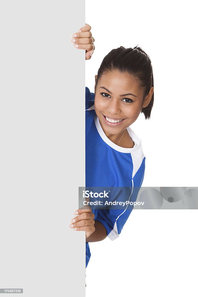 Jovem feliz segurando a placa de vôlei e - Foto de stock de Adulto royalty-free