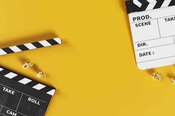 istock Minimal backdrop with movie clapperboard and popcorn, 3d rendering 1743582336