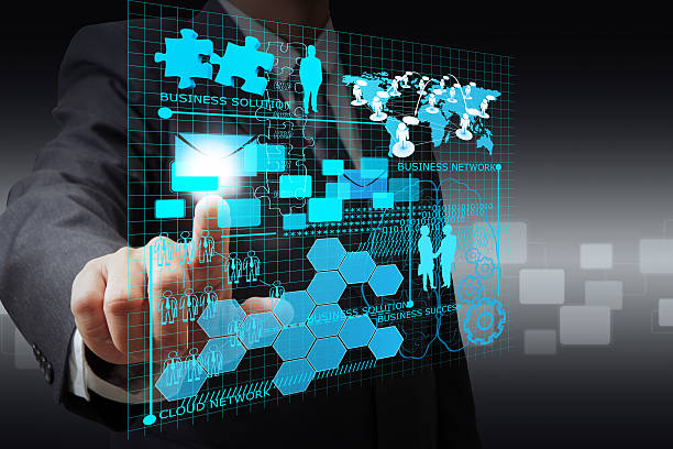 istock businessman hand point on virtual business network 174360215