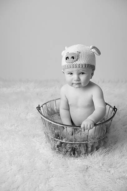 istock Serious Baby Wearing a Knitted Hat 174360542