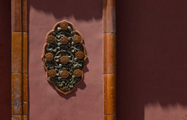 Decoration on red wall in Forbidden City, Beijing, China