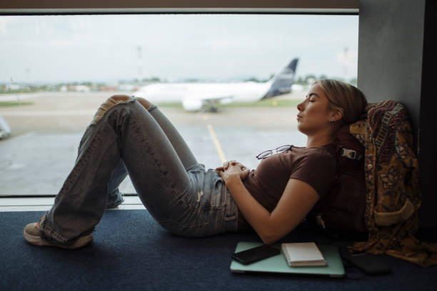 Nap at the airport stock photo