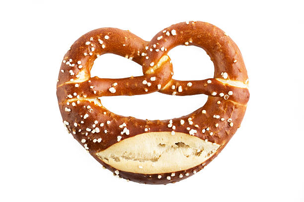 Bavarian Pretzel on White Bavarian Pretzel isolated on White pretzel photos stock pictures, royalty-free photos & images