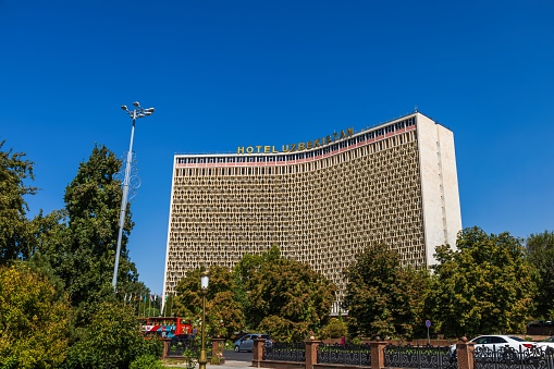 Tashkent, Uzbekistan - August 15, 2023: Central hotel and landmark Hotel Uzbekistan located on the central square named after Amir Temur.