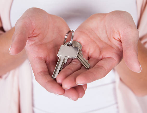istock Smiling woman with a set of keys 174374676