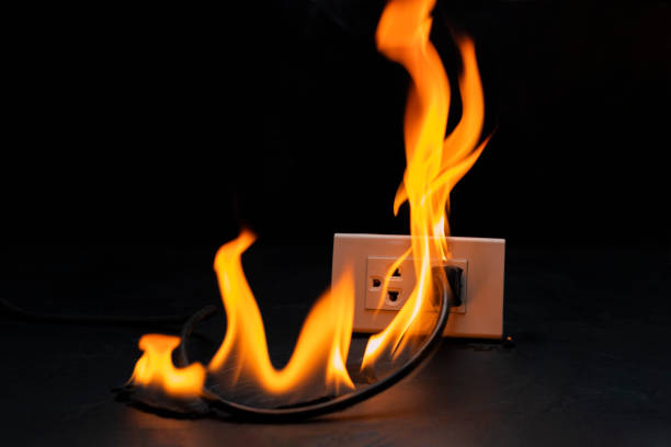 istock An electrical plug fire is caused by a short circuit of electrical current. Concept of prevention of danger. Using non-standard equipment, damaged equipment 1743762631