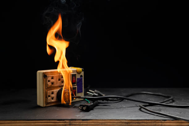 istock An electrical plug fire is caused by a short circuit of electrical current. Concept of prevention of danger. Using non-standard equipment, damaged equipment 1743762633