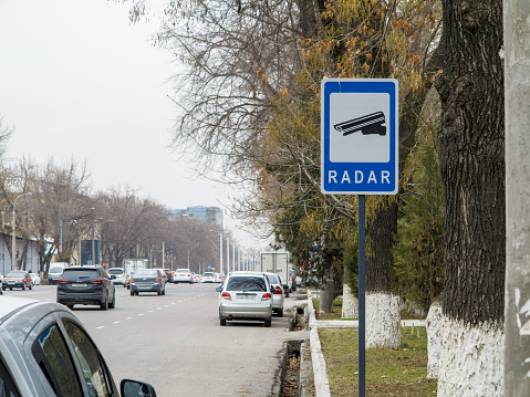 Tashkent, Uzbekistan - 13.02.2023: Radar sign regulating the speed of car traffic on the road