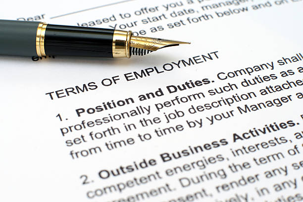 Close up of employment contract and pen Employment contract employment and labor stock pictures, royalty-free photos & images