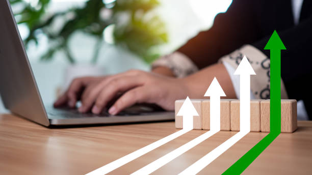 istock Businessman working showing graph with upward arrow for future growth plan of organization as business development concept for success and financial growth. 1743815509
