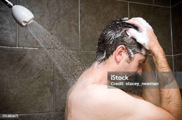 Man Showering Water Washing Over Him Stock Photo - Download Image Now - Men, Shower, Shampoo