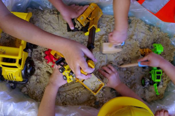 istock Toddlers playing in sand 1743836517