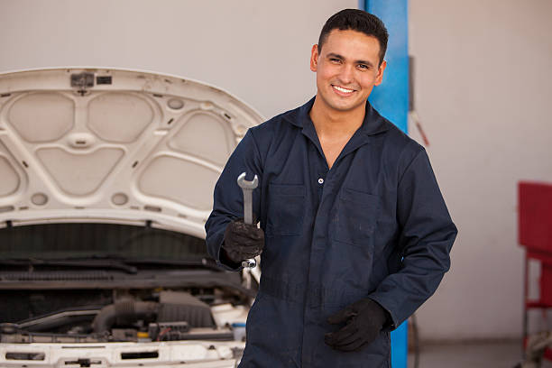 istock Young mechanic loving his job 174383778