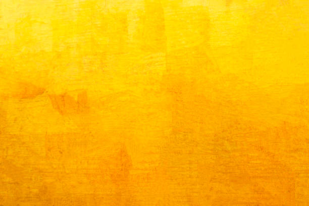 istock Old glod metal wall background or texture and shadow 1743838372