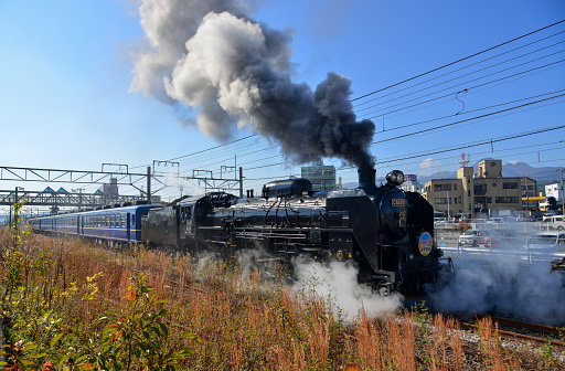 Branson, Missouri, USA—September 7, 2019: Branson Scenic Railway trains take tourists an hour and a half into the Ozark Mountains. Conductors tell the history of how the rails were laid through the mountains.