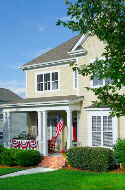istock Victorian Style Home Clad with an American Flag and Bunting 174384176