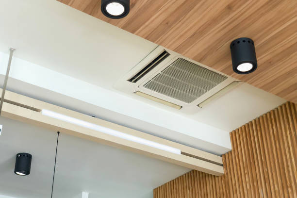 istock Modern ceiling mounted cassette type air conditioning system in coffee shop 1743846469