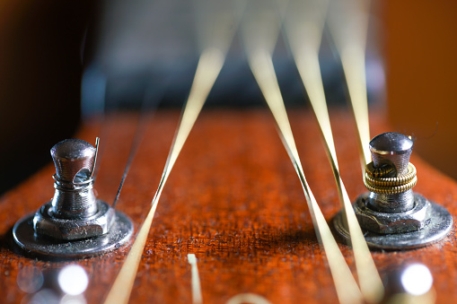 Gu Zheng. The Zheng is a traditional Chinese musical instrument