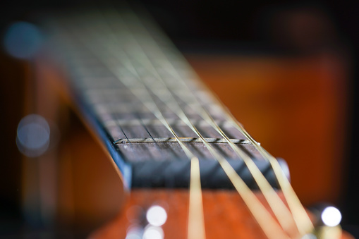 classical wooden guitar studio shot