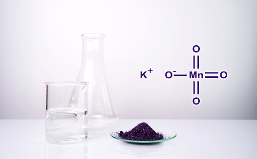 Potassium permanganate (KMnO4) with chemical structure , a common chemical compound that combines manganese oxide ore with potassium hydroxide.