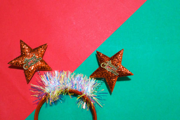 istock Funny Christmas headbands on color background 1743892838