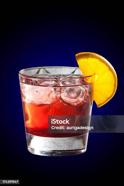 Cocktail With Grenadine Juice And Lemon Stock Photo - Download Image Now - Alcohol - Drink, Citrus Fruit, Cocktail