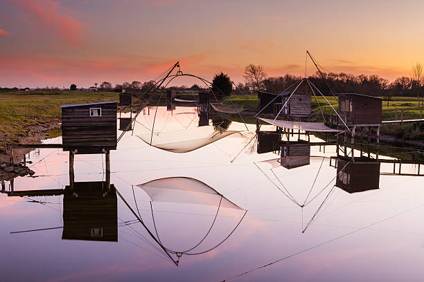 Reflection of fisheries - La Barre de Monts, France stock photo