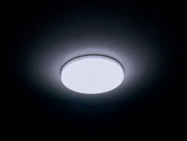 LED ceiling light glowing at night darkness bathroomlight ceilingmounted LEDlamp LEDlight ceilinglight mountedlight flushmount plafonnier image lampara techo picture luz teto photo stock photo