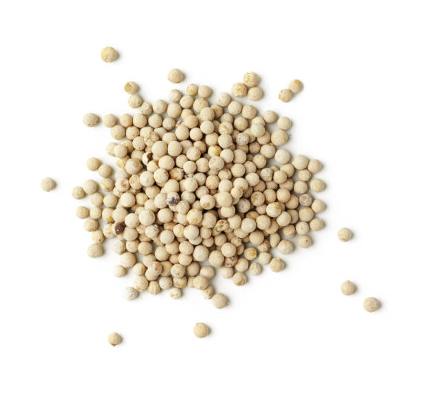 istock Heap of white peppercorns isolated on white background 1743944282